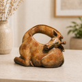 Sleeping giraffe sculpture