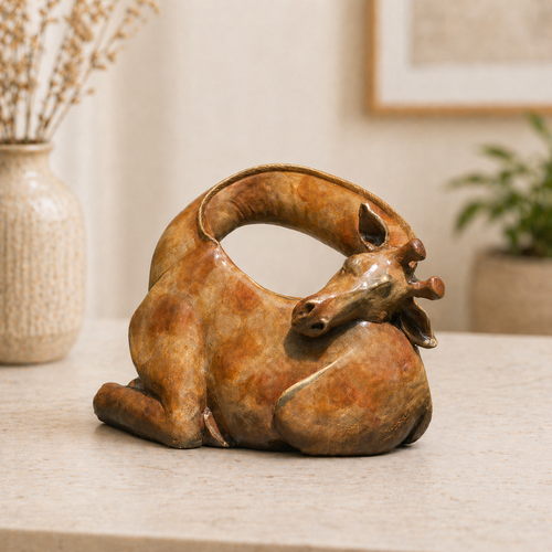 Sleeping giraffe sculpture