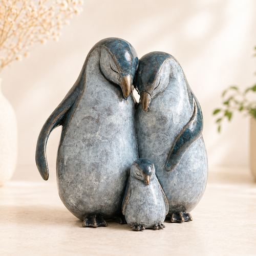 Penguin family sculpture