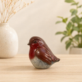 Bronze sculpture of a robin