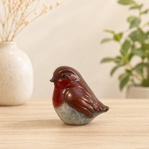 Bronze sculpture of a robin