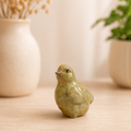 bronze sculpture of a chick