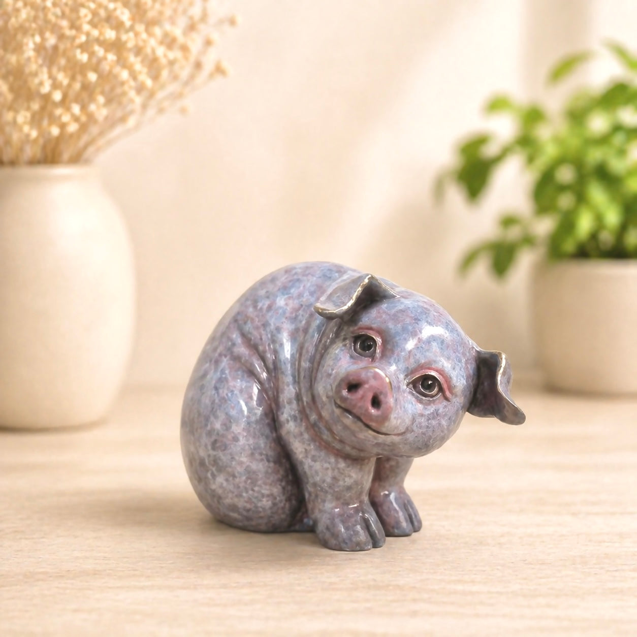 Bronze sculpture of a pig