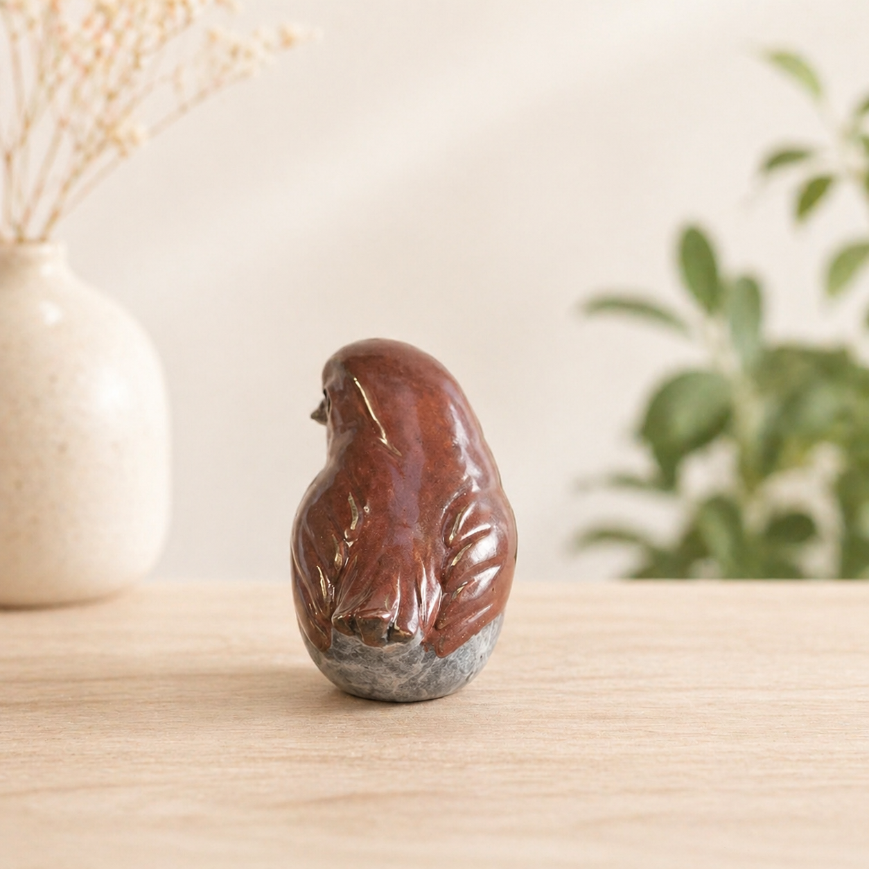 Bronze sculpture of a robin 