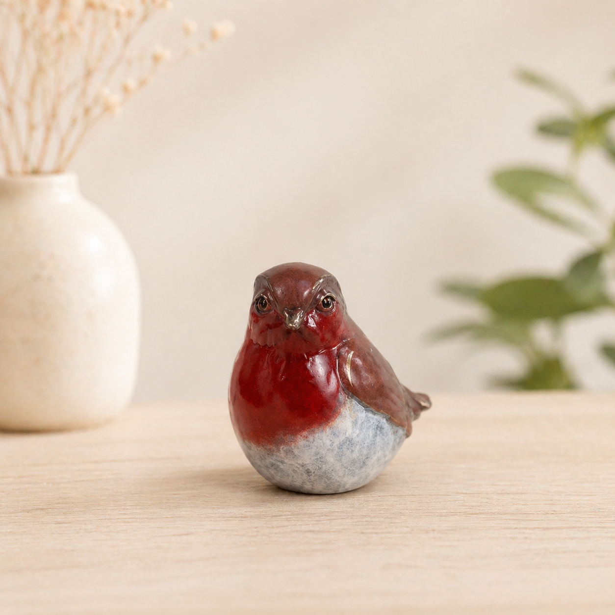 Bronze sculpture of a robin 